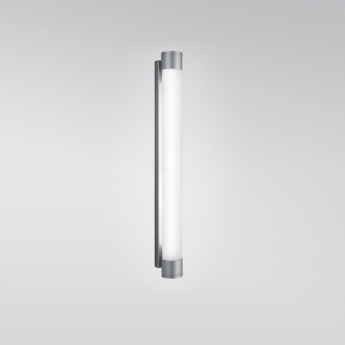 A luminous wall sconce in a thin tube shape with metal caps on each end