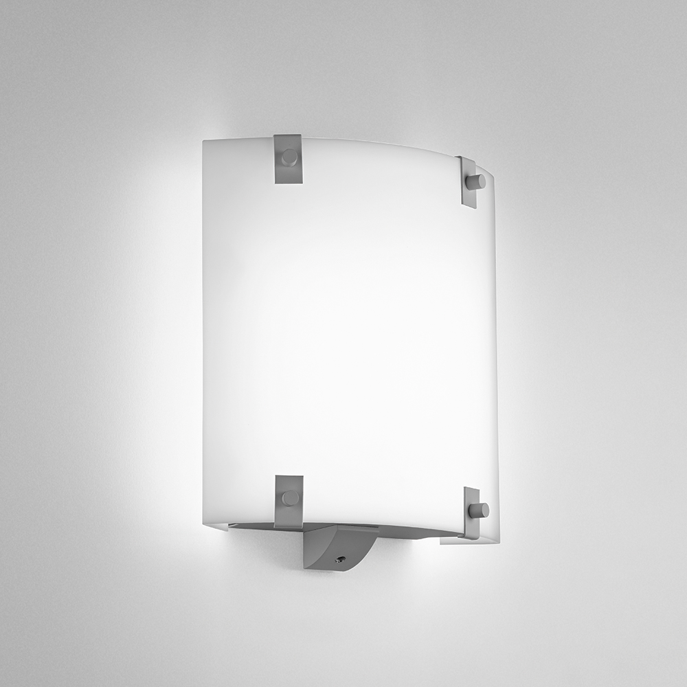 A small, square wall sconce with button accents