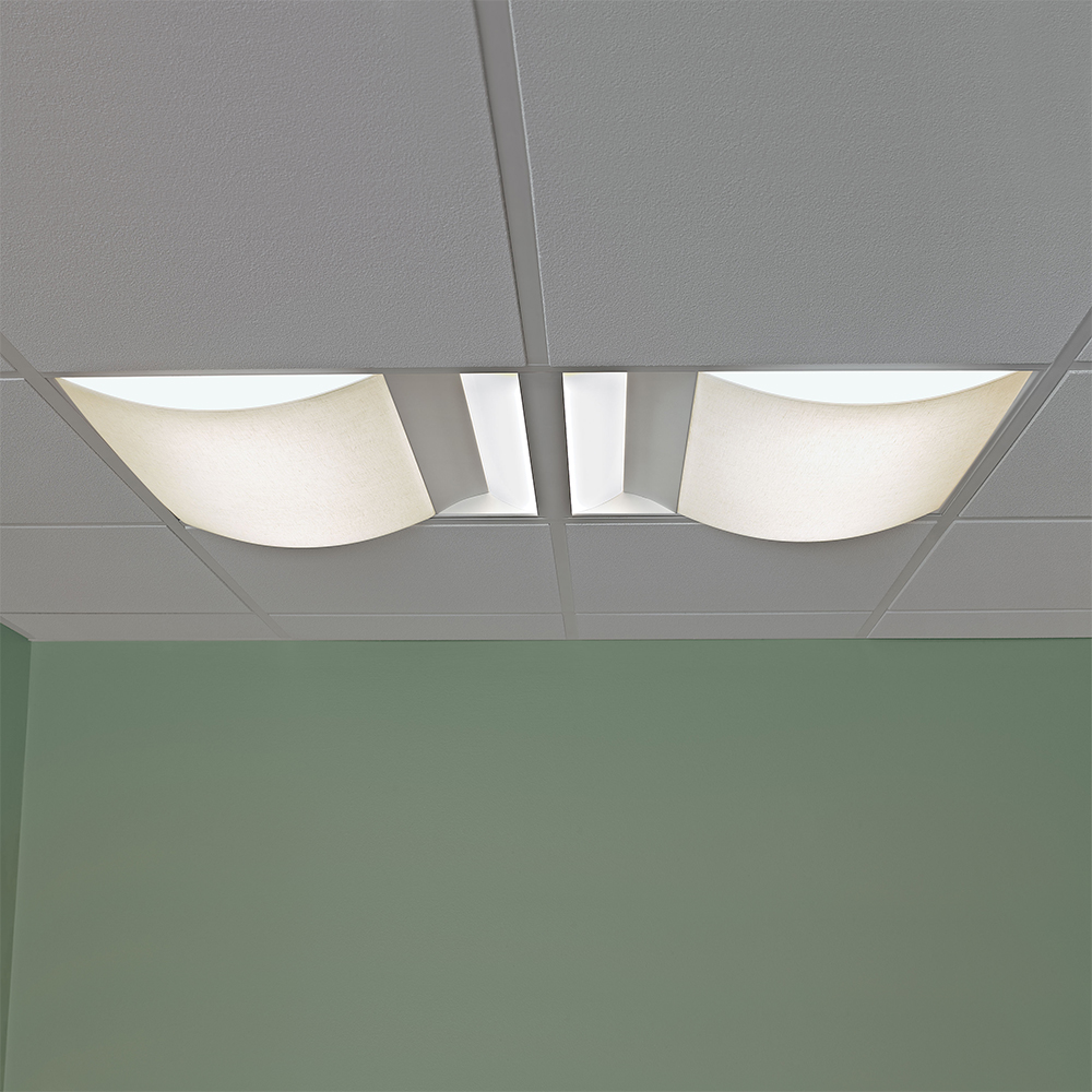 A 2x4 ceiling fixture with a curved fabric-like lens