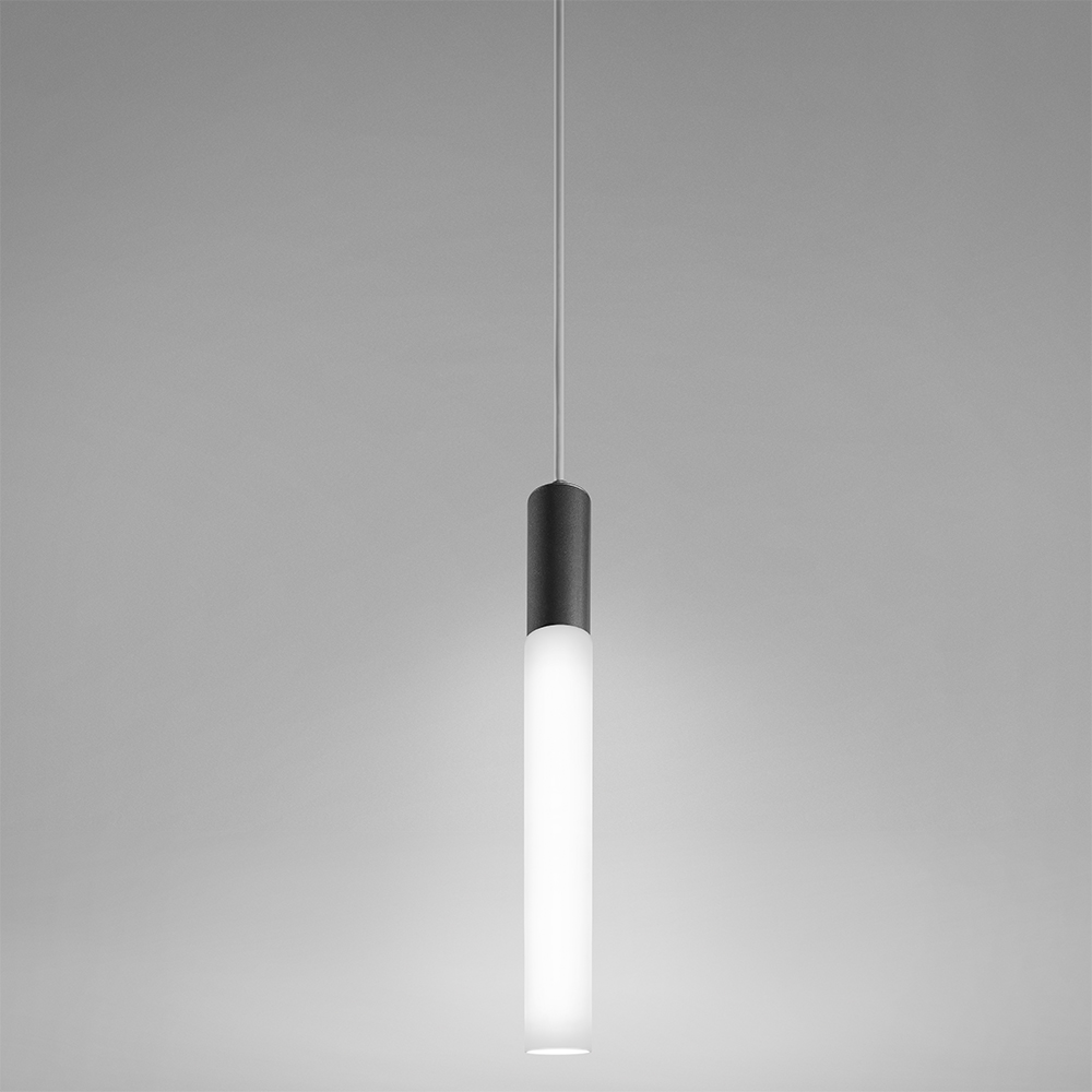 A long, luminous cylinder pendant