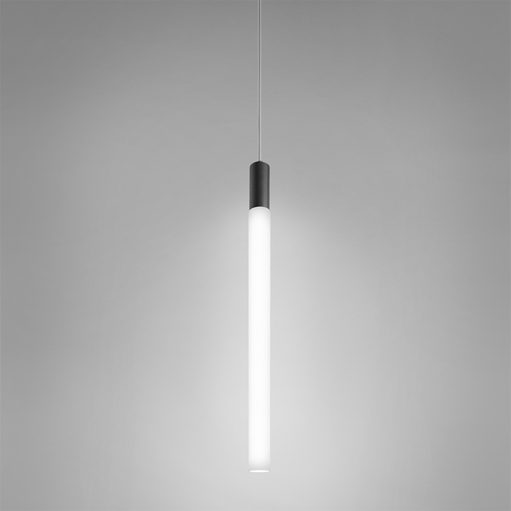 A long, luminous cylinder pendant