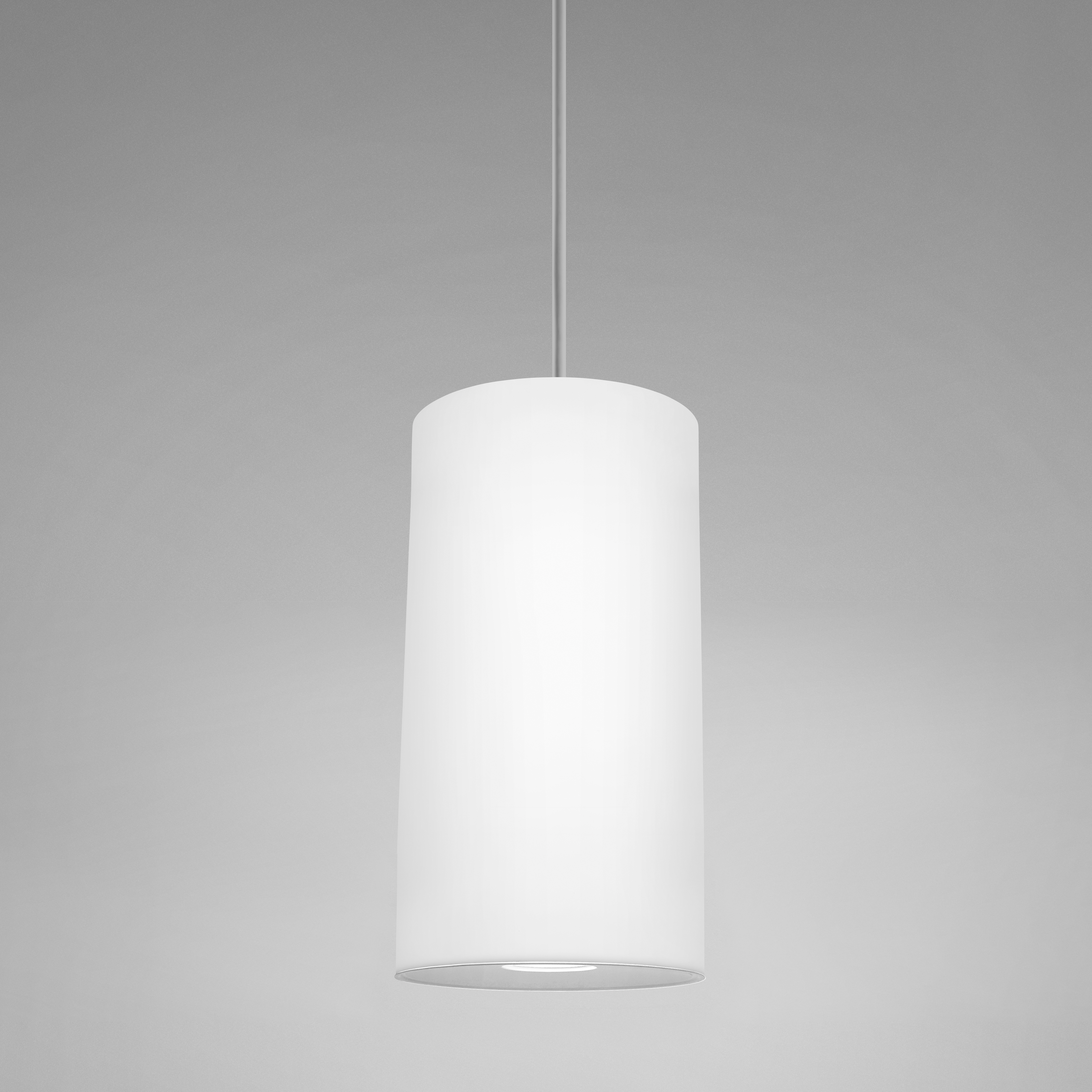 A long, luminous cylinder pendant