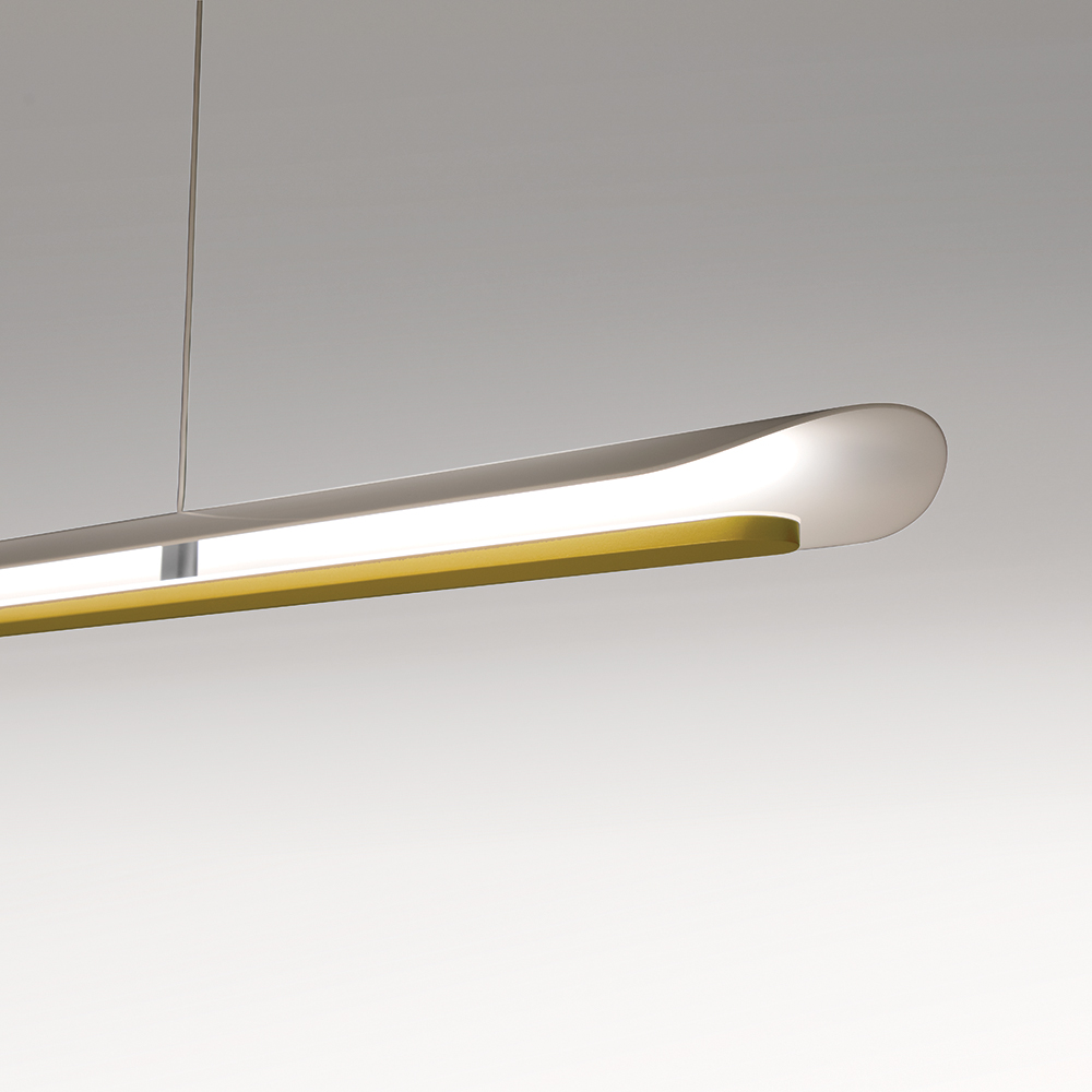 The translucent diffuser that gently curves around a thin LED lightbar. The minimalist linear pendant lighting..