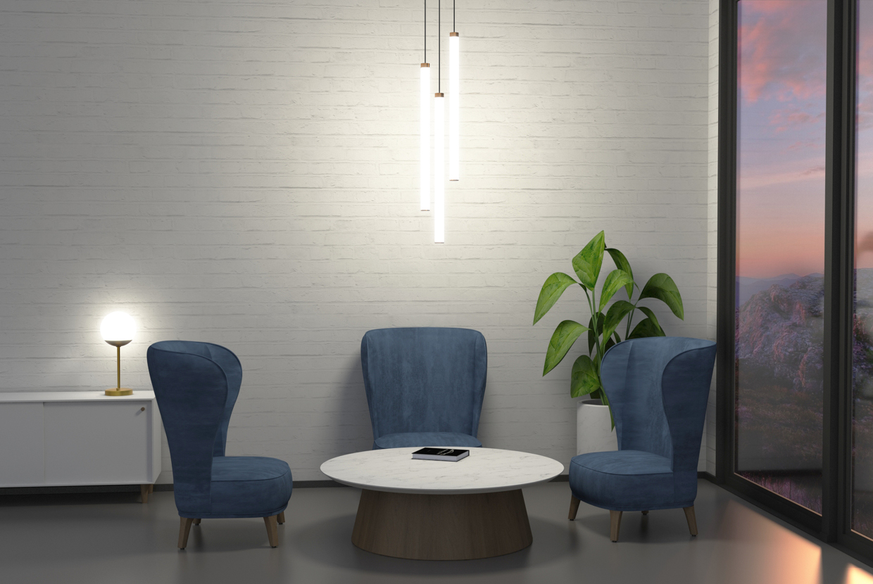 Blue chairs in waiting room with cluster of three small cylinder pendant lights hanging above. 