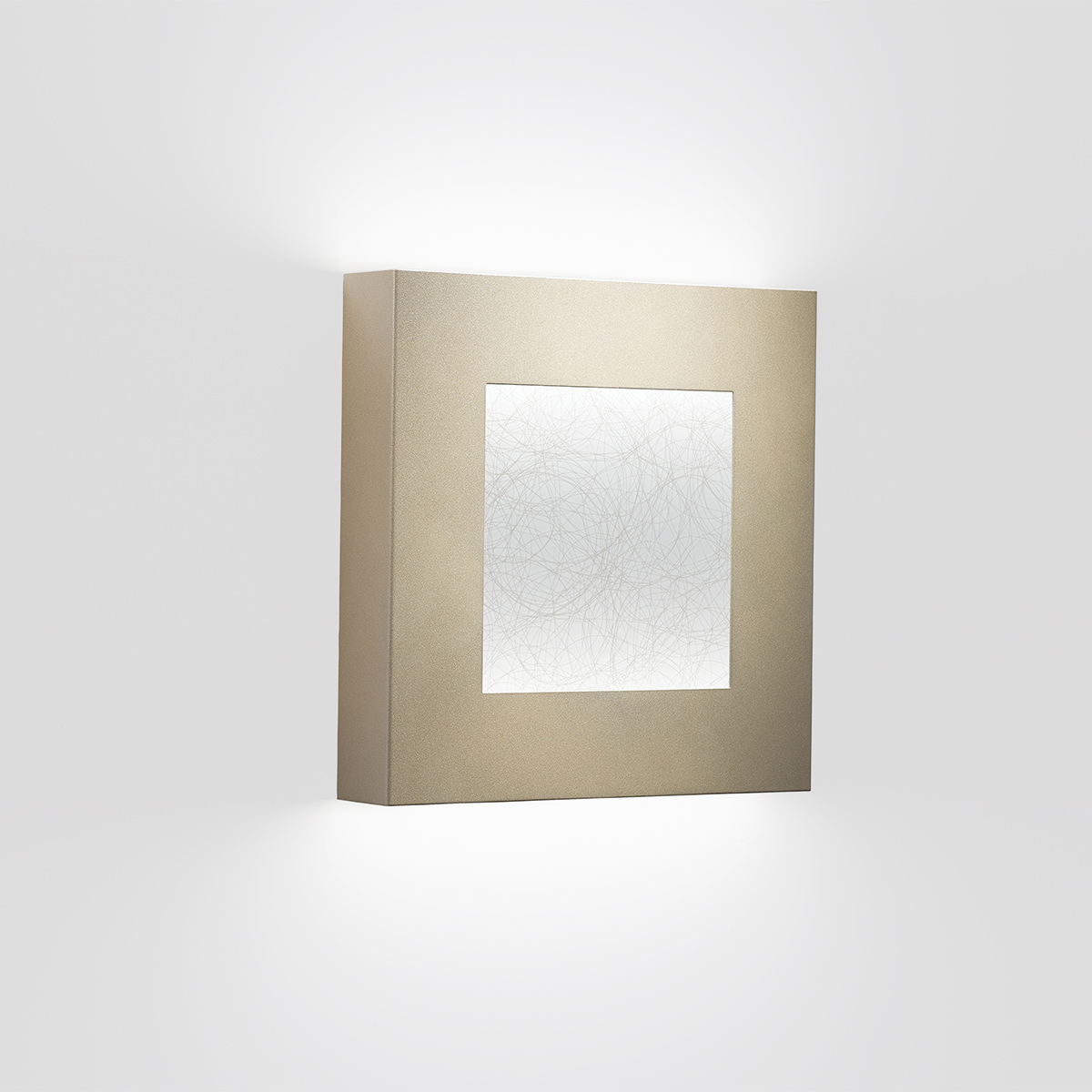 A square wall sconce with a diffuser window