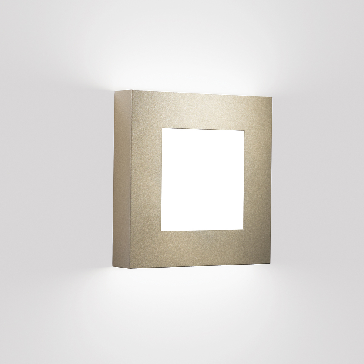A square wall sconce with a diffuser window