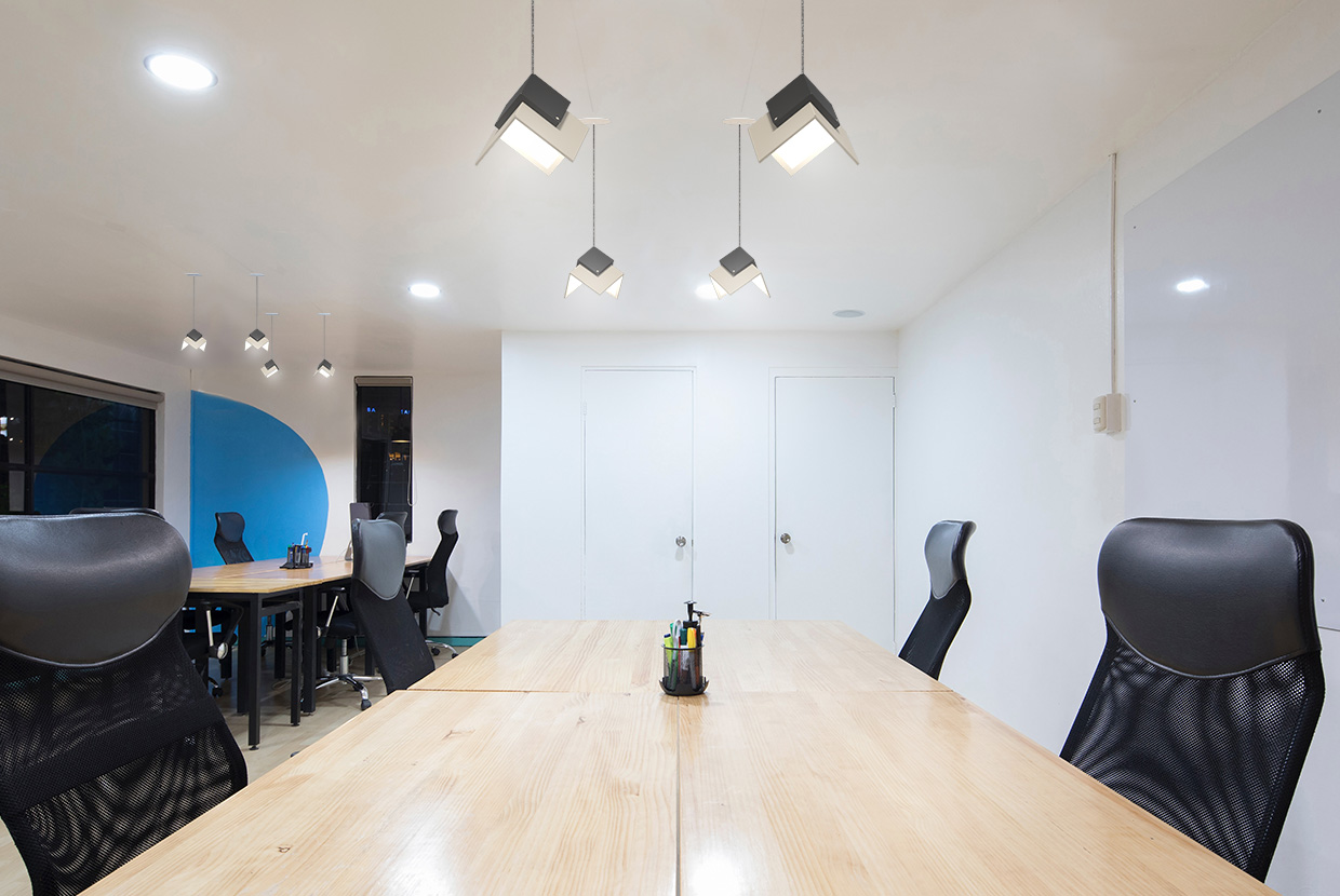 Petal pendants give a soft ambient light without overwhelming the eye. The flat panels provide uniform output by emitting diffuse light without secondary optics (as is necessary when using an LED source).