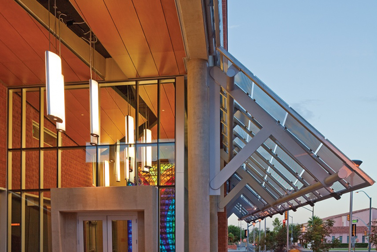 Elliptical pendant lights installed in college campus lobby