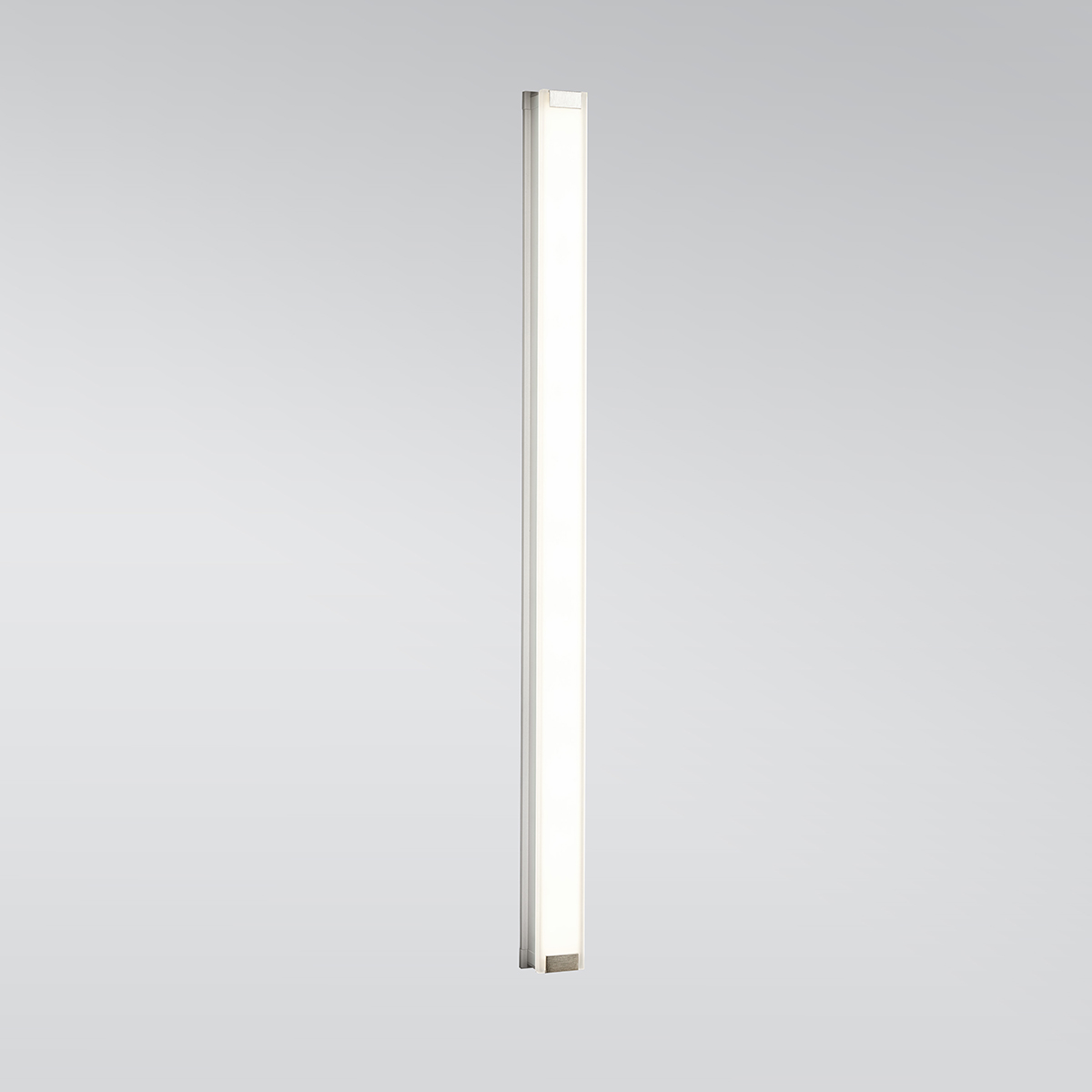 A flat linear wall sconce with a thin, luminous body 