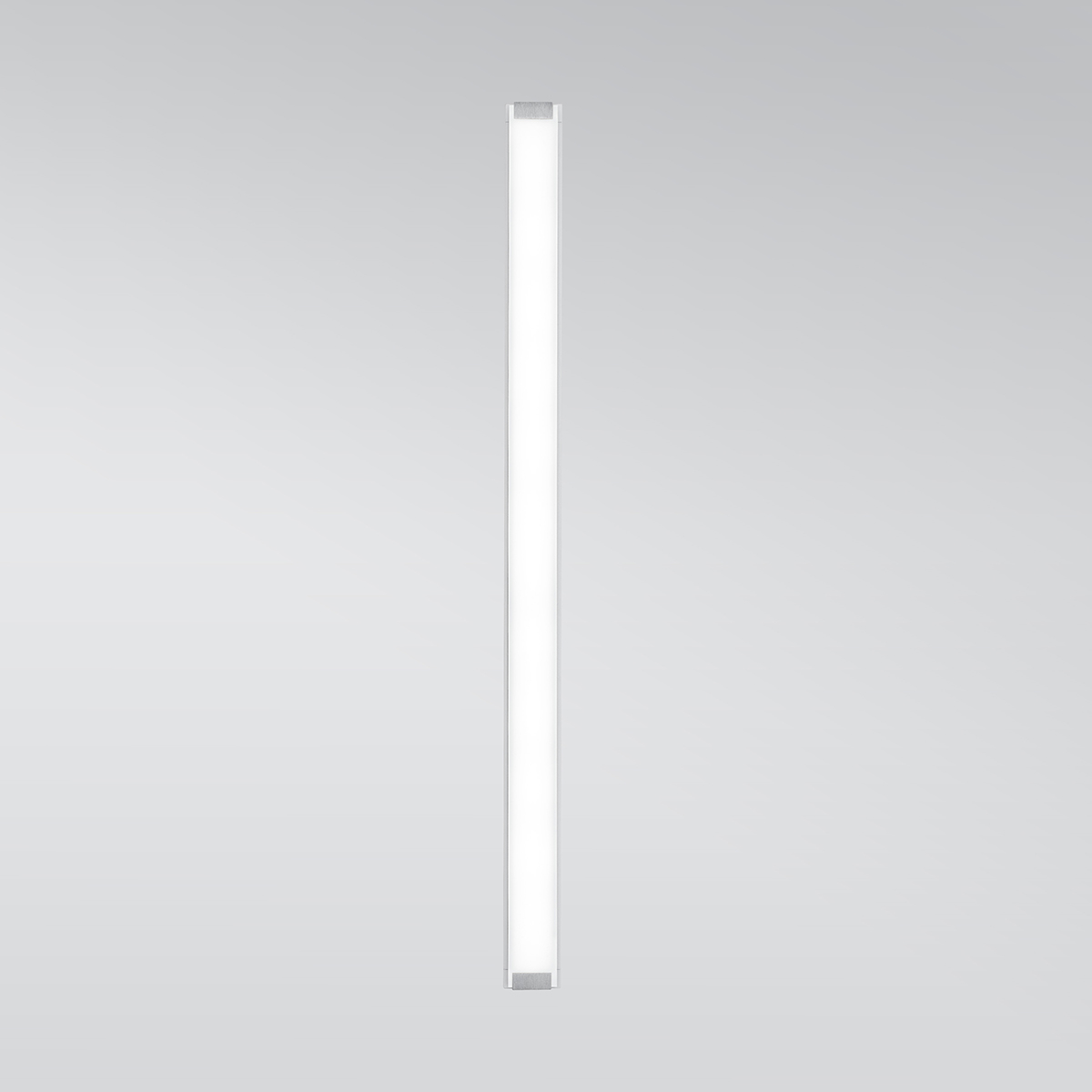 A flat linear wall sconce with a thin, luminous body 