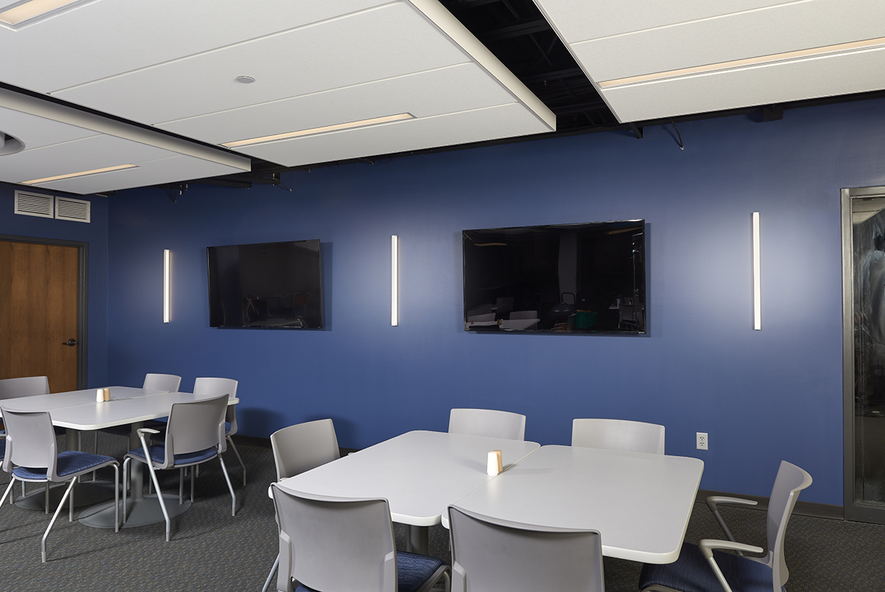 Sleight luminaire sconces in Visa Lighting lunchroom