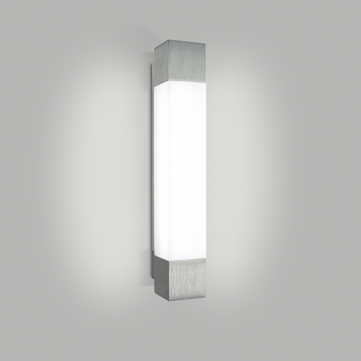 A luminous rectangular wall sconce with solid end caps
