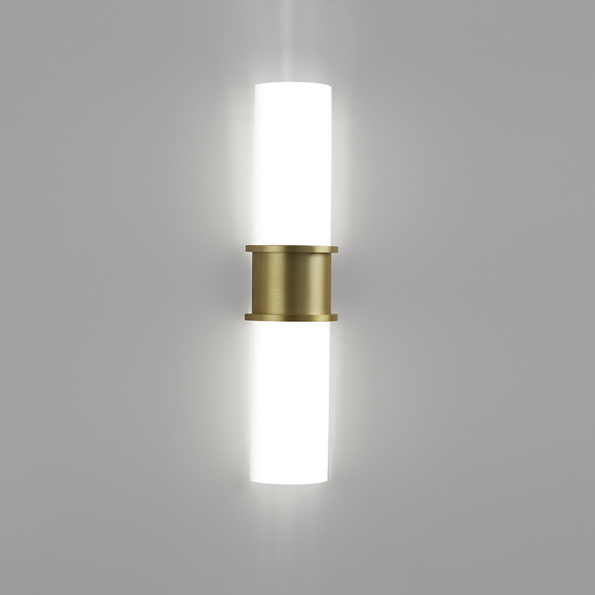 A large indoor wall sconce with luminous diffusers and a center accent 