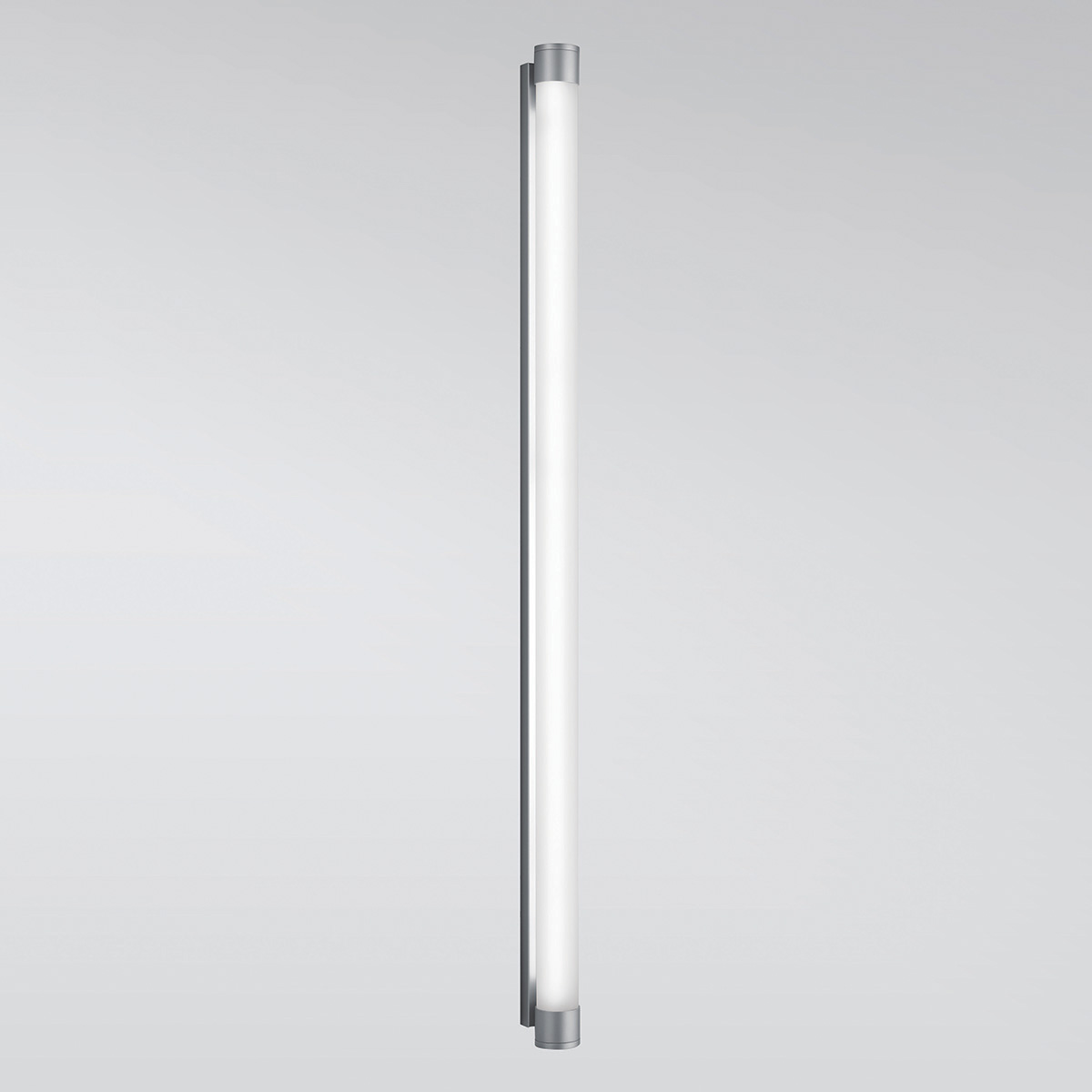 A luminous wall sconce in a thin tube shape with metal caps on each end