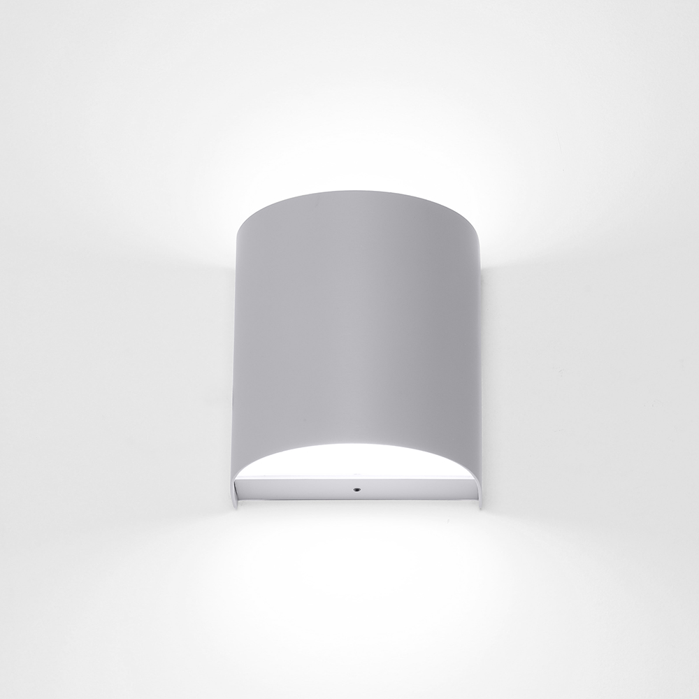 Naya is a smooth semi-cylinder shaped ADA healthcare sconce.