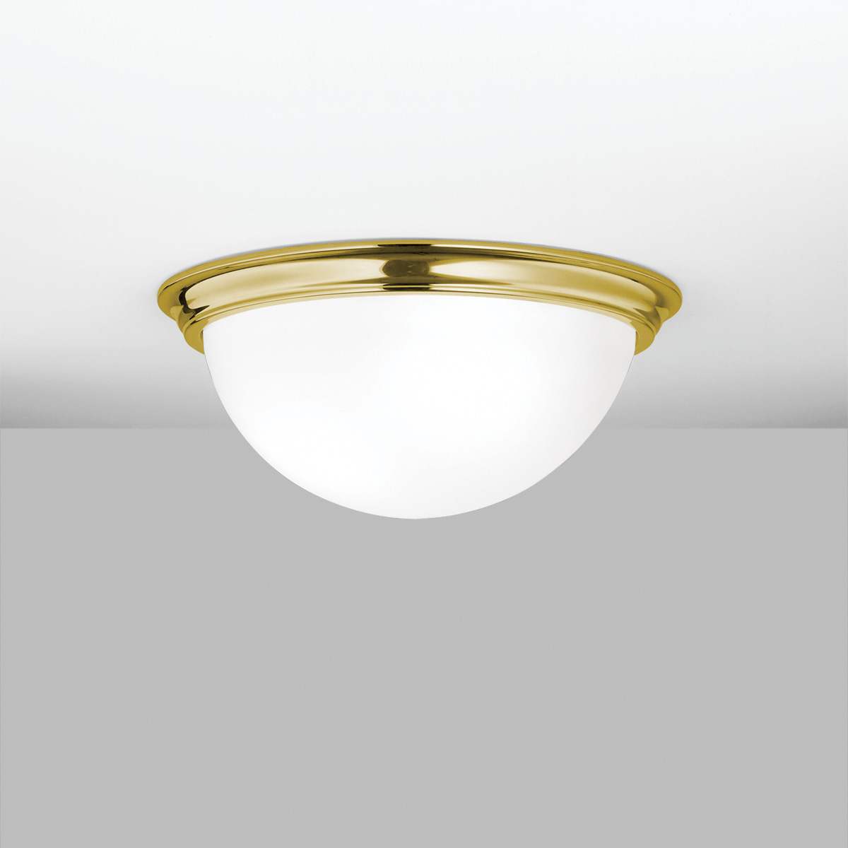 A ceiling-mounted bowl fixture with a deep luminous bowl