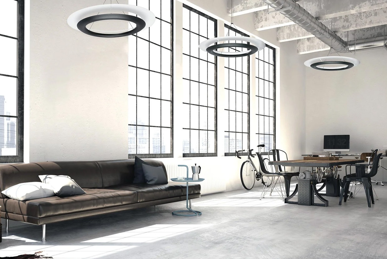 Loft office building with modern furnishings and Visa Lighting ring pendant lights 