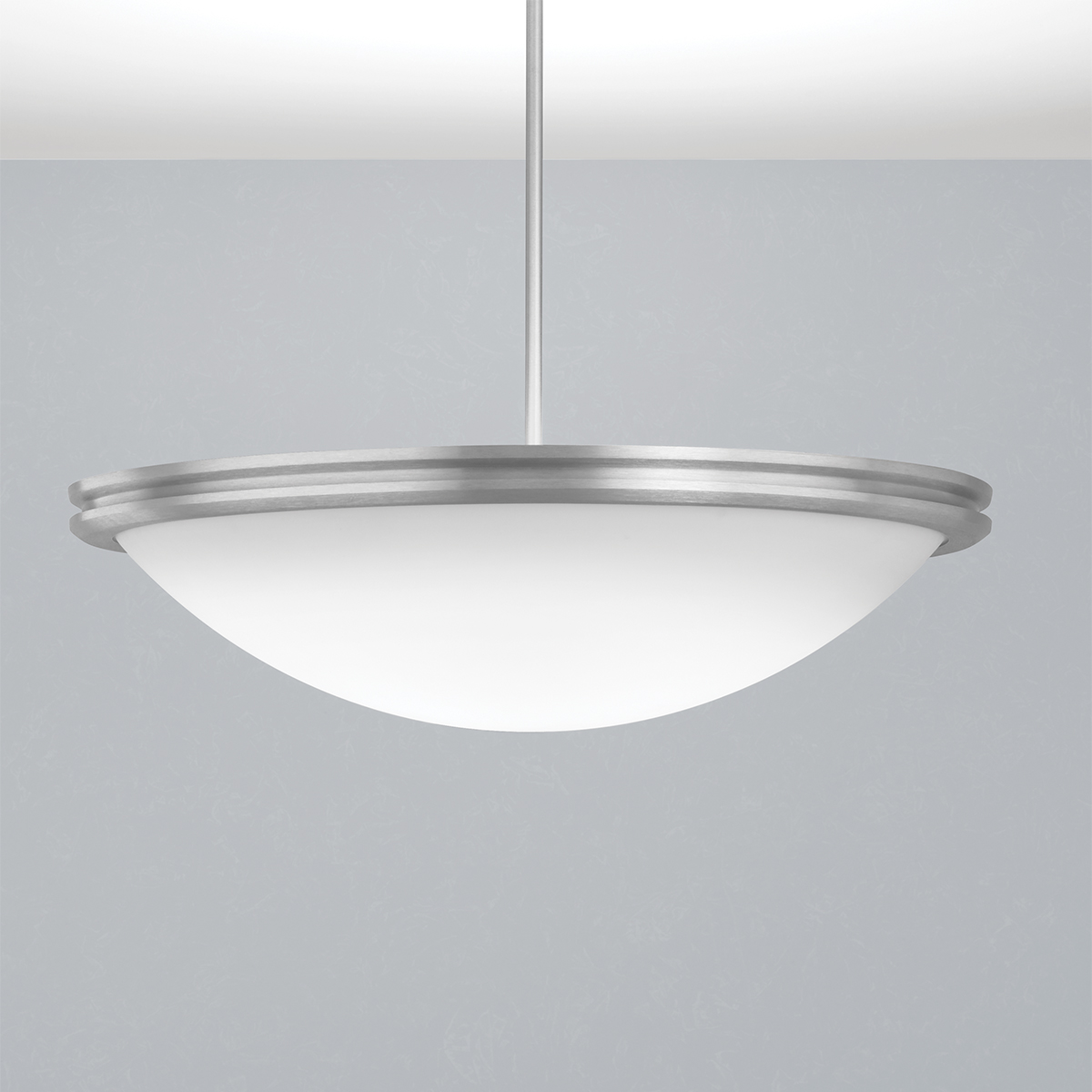 A large bowl pendant suspended with a stem