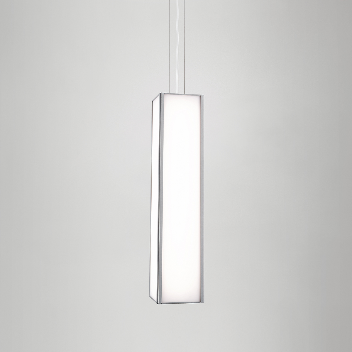 A large, rectangular pendant with a frame and luminous diffuser body 