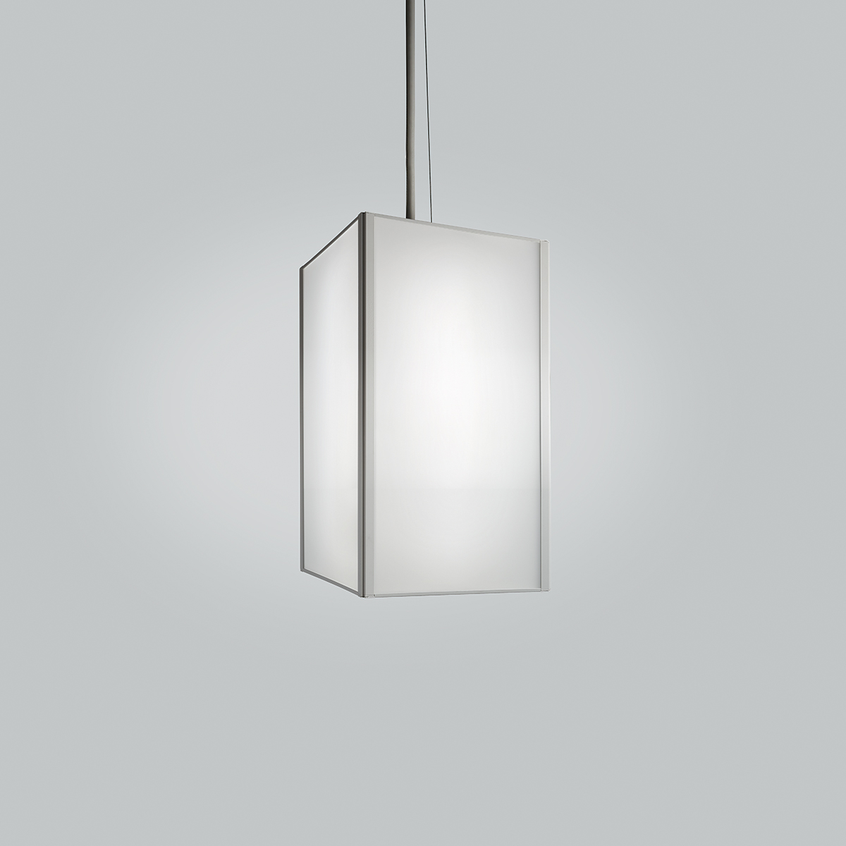 A large, rectangular pendant with a frame and luminous diffuser body 