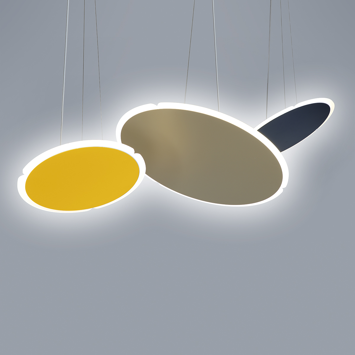 Three sizes and colors of Sail light fixture from Visa Lighting