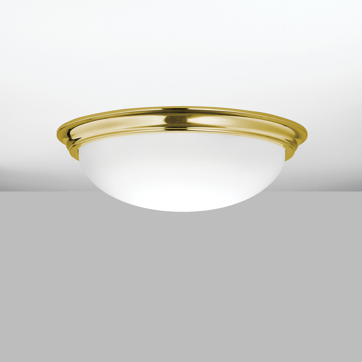 A ceiling-mounted bowl fixture with a shallow luminous bowl