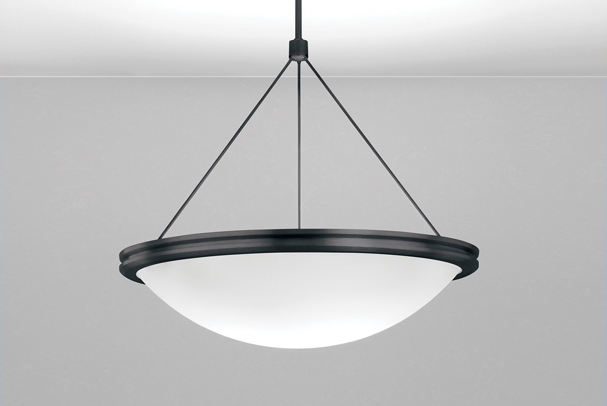 A large bowl pendant suspended with a cable