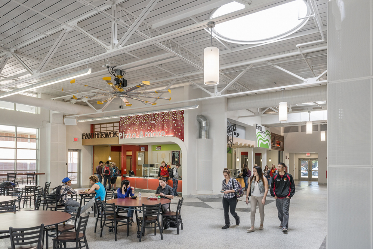 Cylinder pendants accent commercial lighting applications, seen here above a clean food court. 