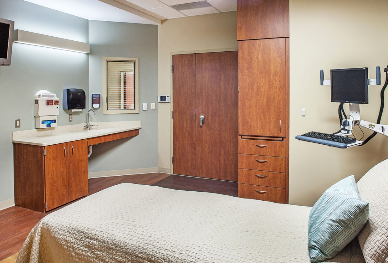 Linear Art Sconce In Patient Room Above Sink