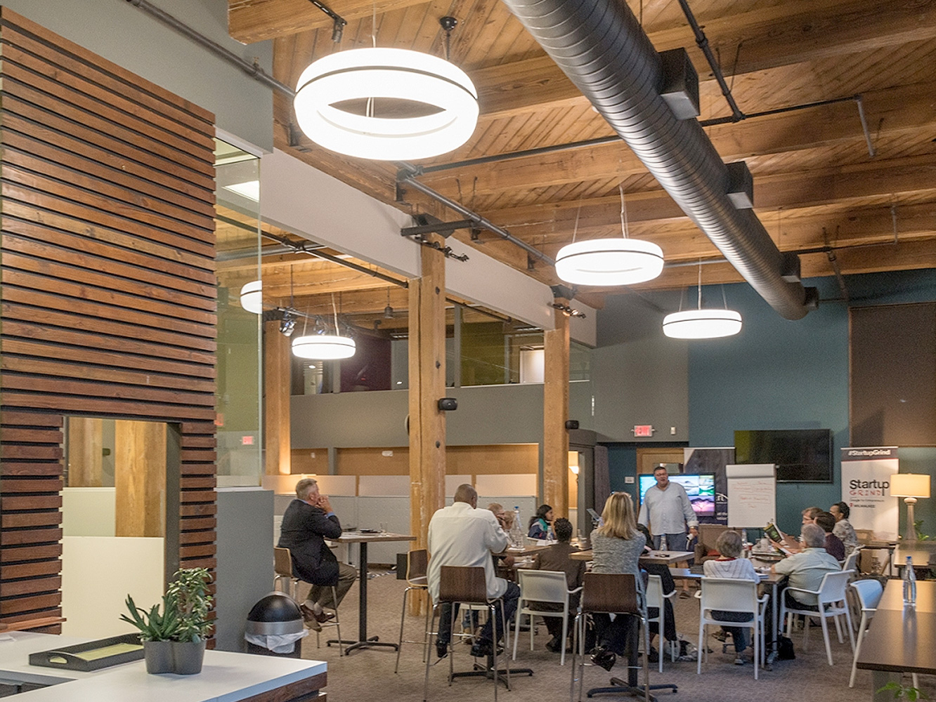 Meridian Square Pendant Lights throughout a workplace