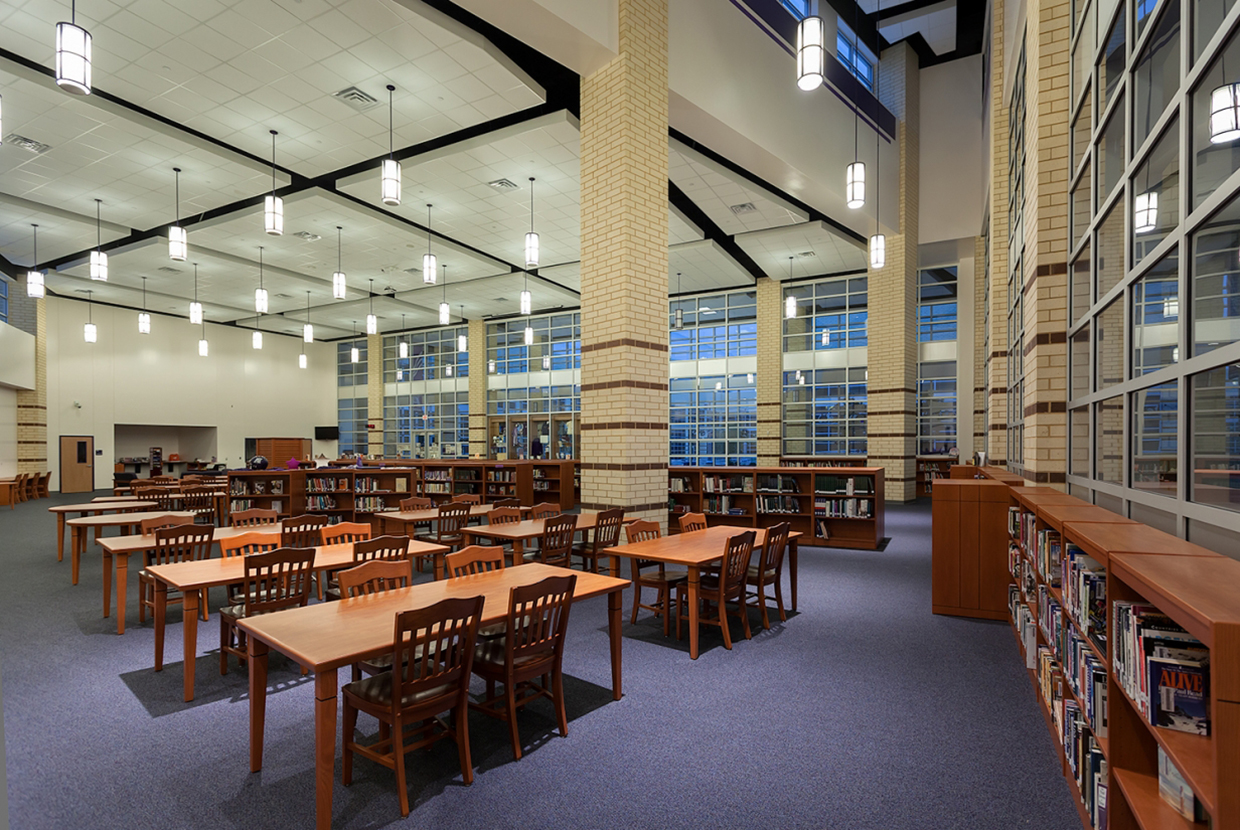 Midland Arts timeless cylindrical pendants above an education lighting application in a campus library. 