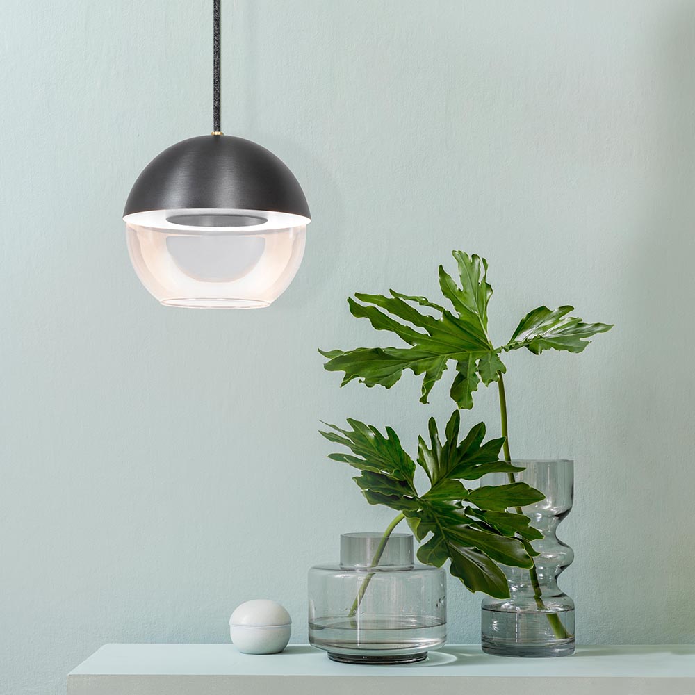 The 8” Muse pendant light globe utilizes a source disk that floats while reflecting indirect light.