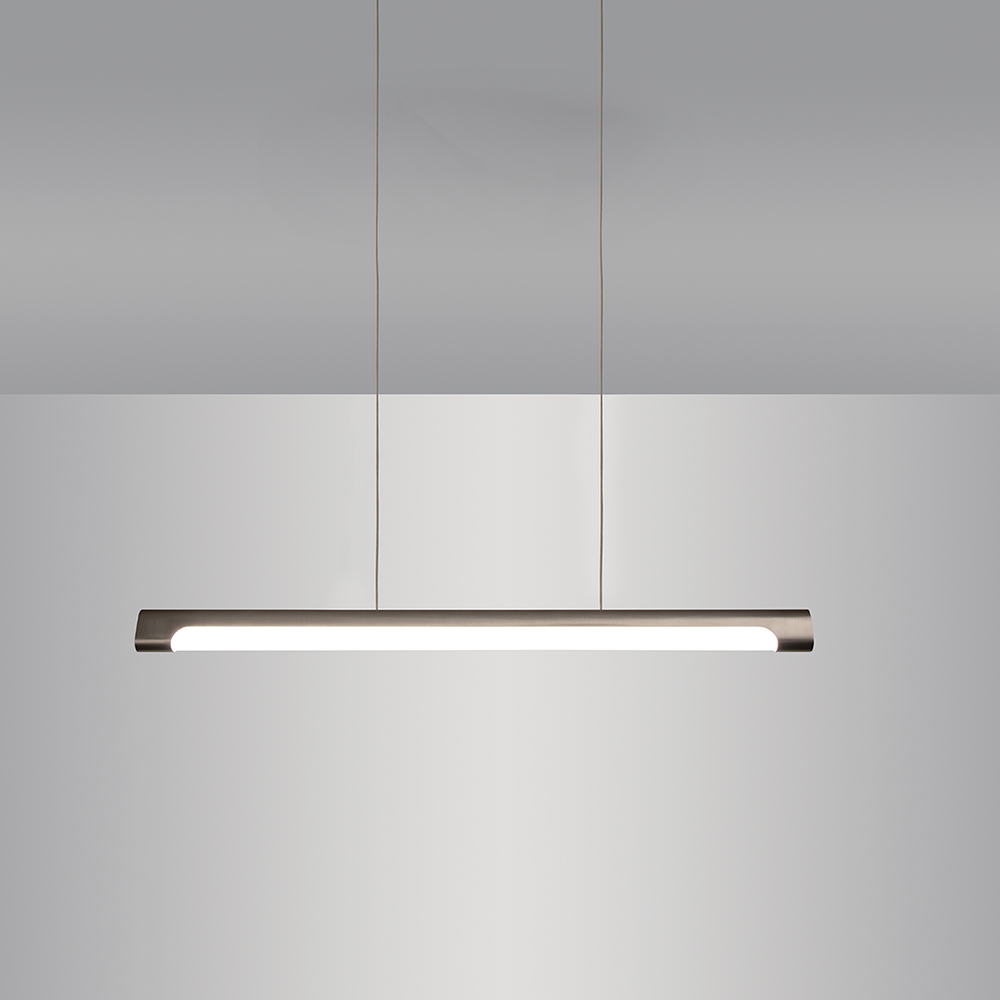 The sleek Nacelle linear pendant light fixture breaks out of the monotony of most linear suspended lights, delivering softer lighting.