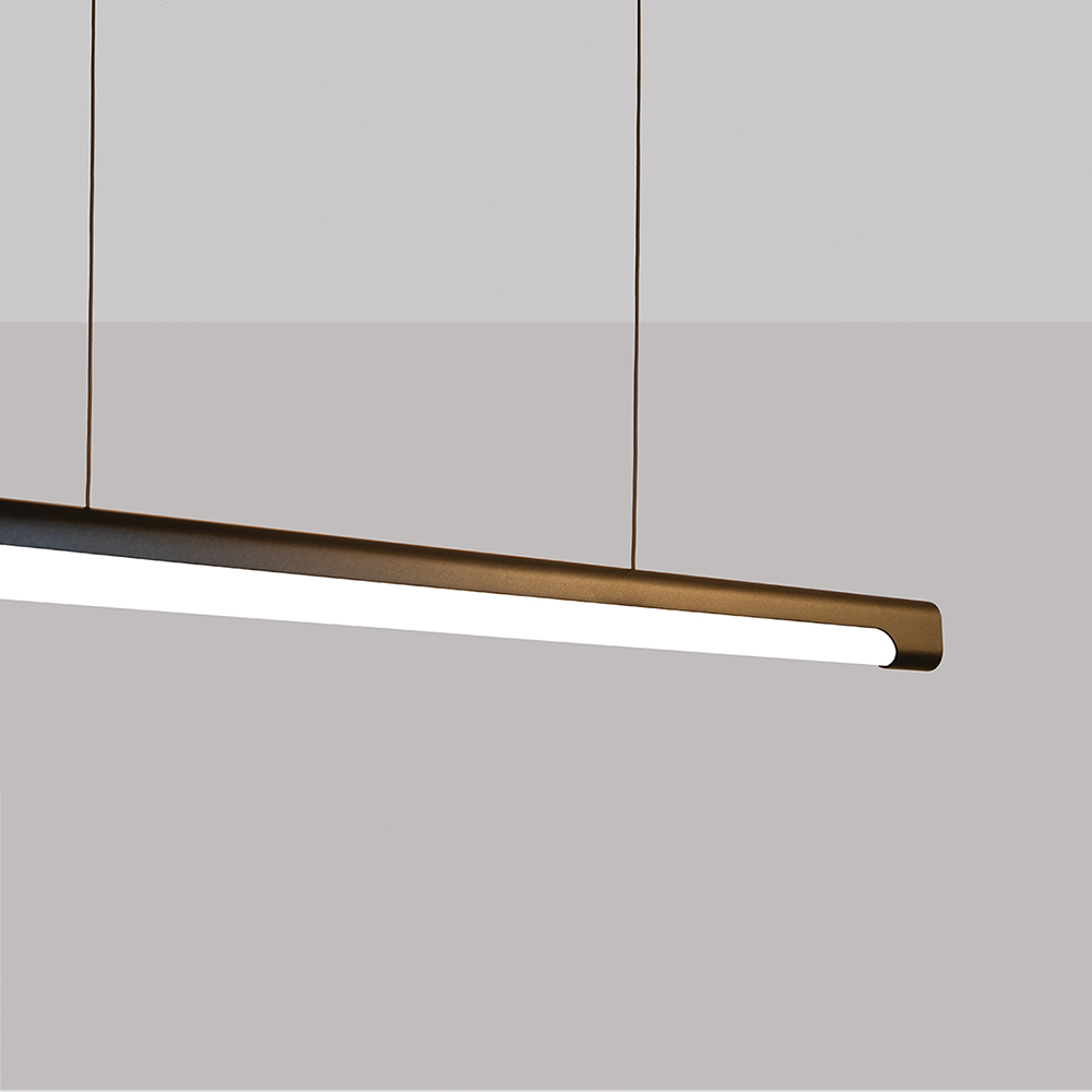 The sleek Nacelle linear pendant light fixture breaks out of the monotony of most linear suspended lights, delivering softer lighting.