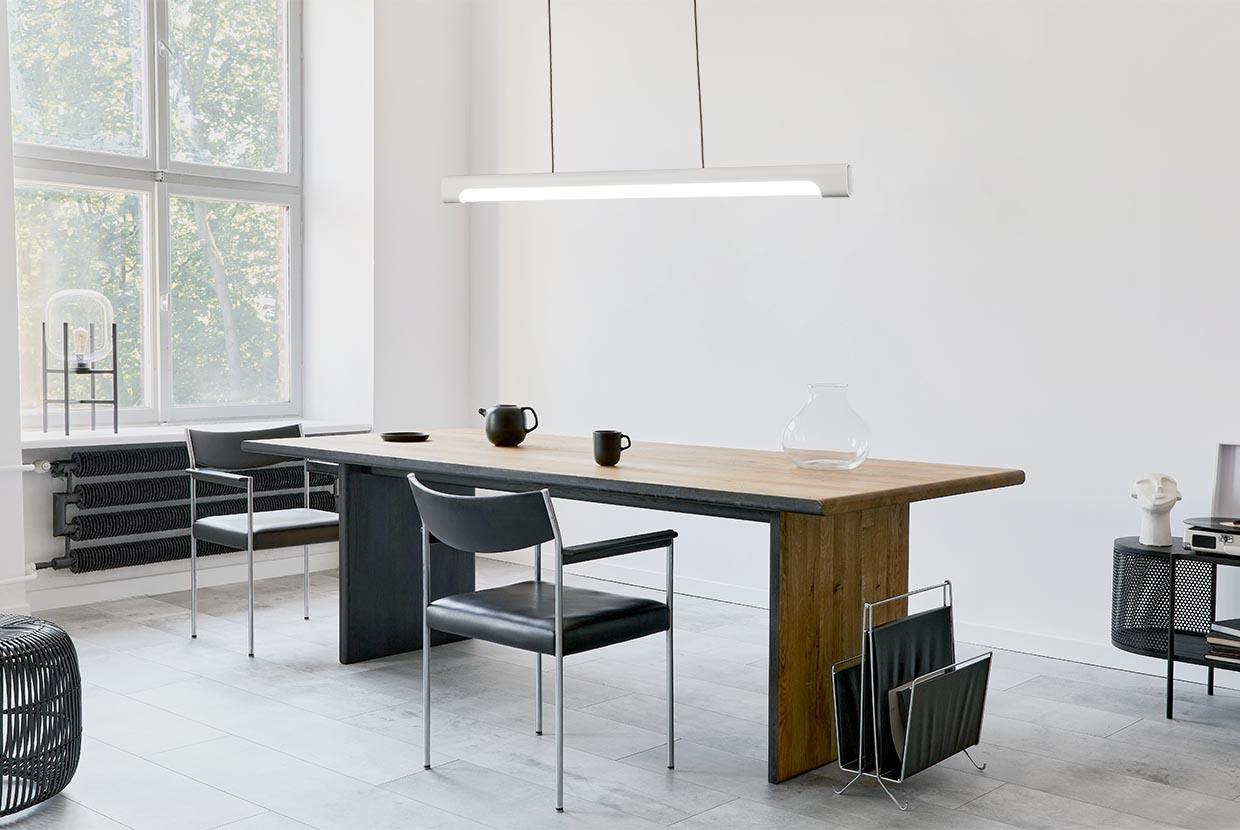 The sleek Nacelle linear pendant light fixture breaks out of the monotony of most linear suspended lights, delivering softer lighting.