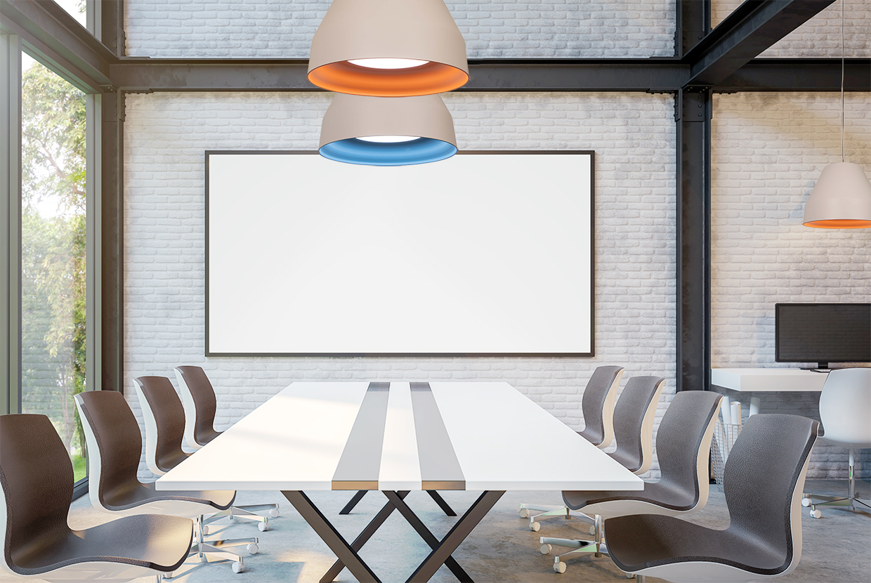 Rocket tapered bell pendant light hung in modern workplace industrial styled building.