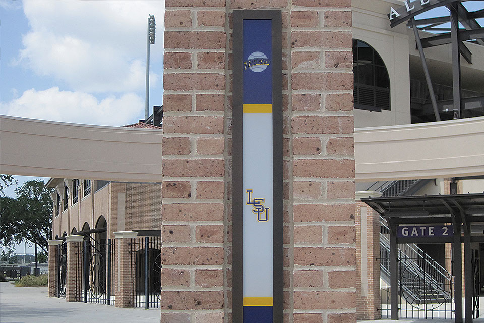 Visage Custom LSU Lighting on Brick Wall