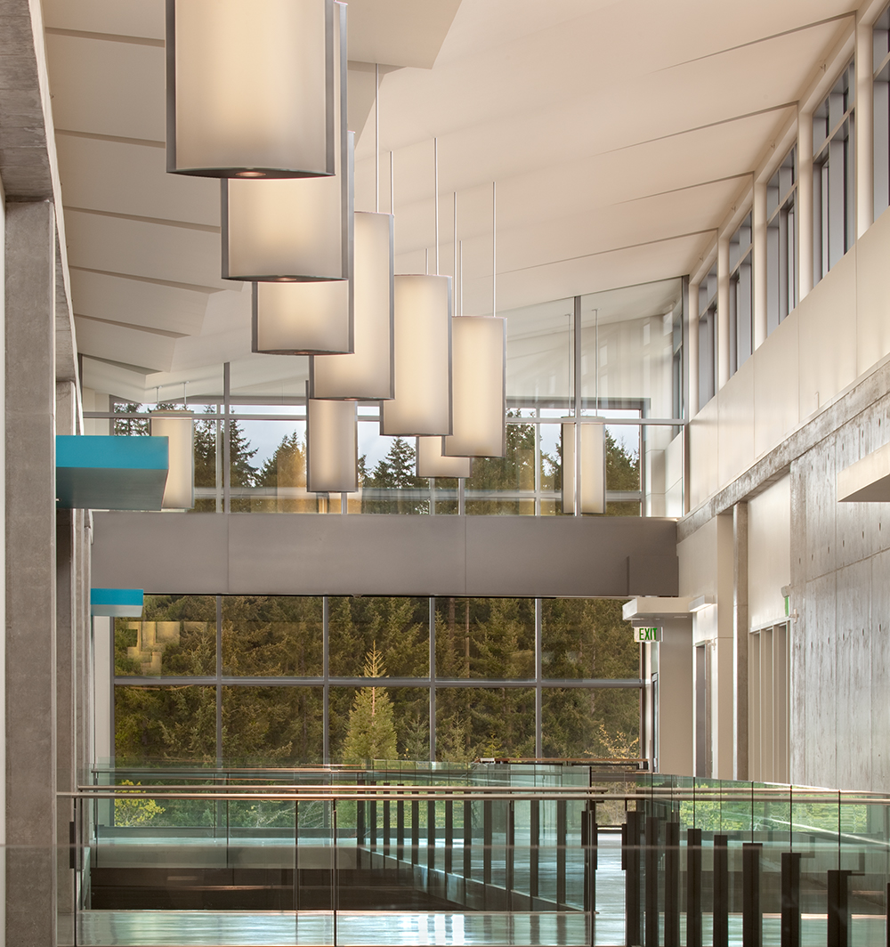 Air Foil pendants mounted along a large university lobby for stunning education design.