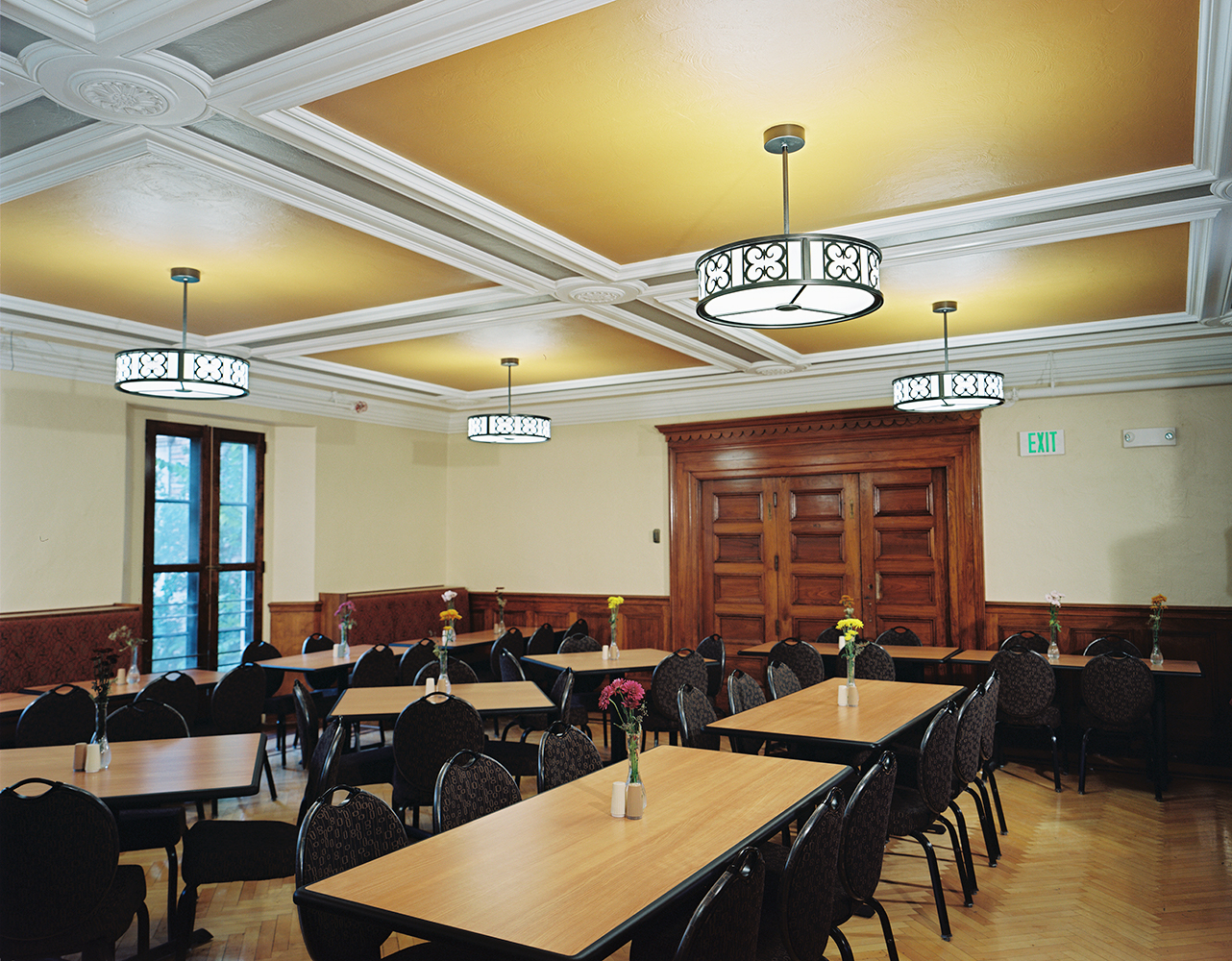 Midland Arts custom light fixtures above a classically designed formal dining area.