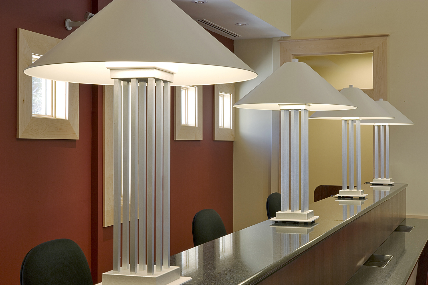South Bay portable lamps provide distinguished architectural lighting on a reception counter.