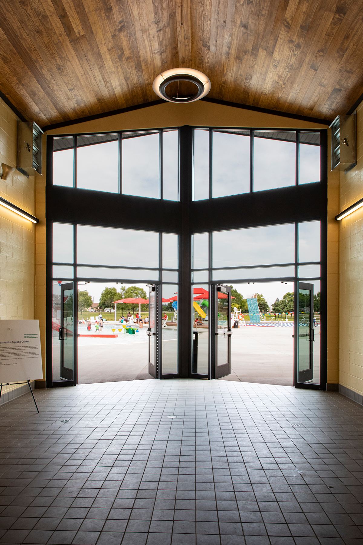 Cosmo ring pendant in the lobby of a community aquatic center