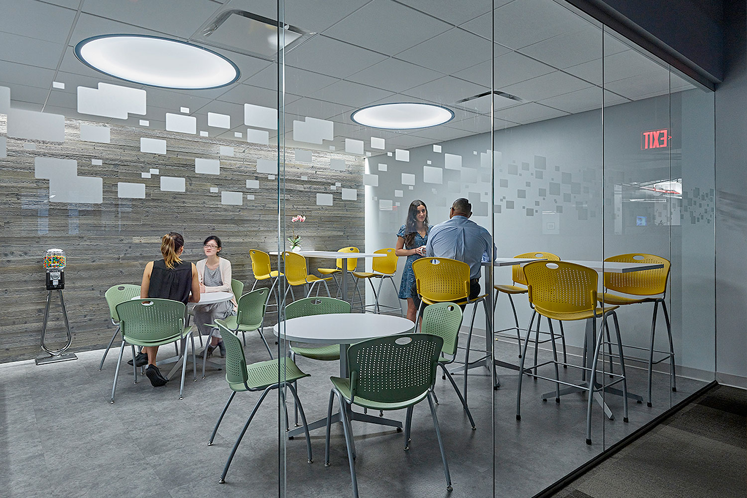 Two Large Symmetry Lights above a space for office meetings