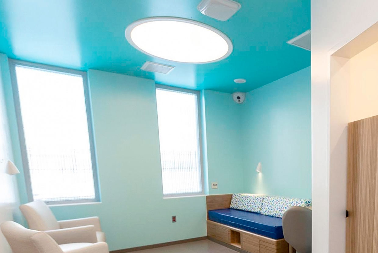 Large Symmetry Lighting on Ceiling of Blue Room
