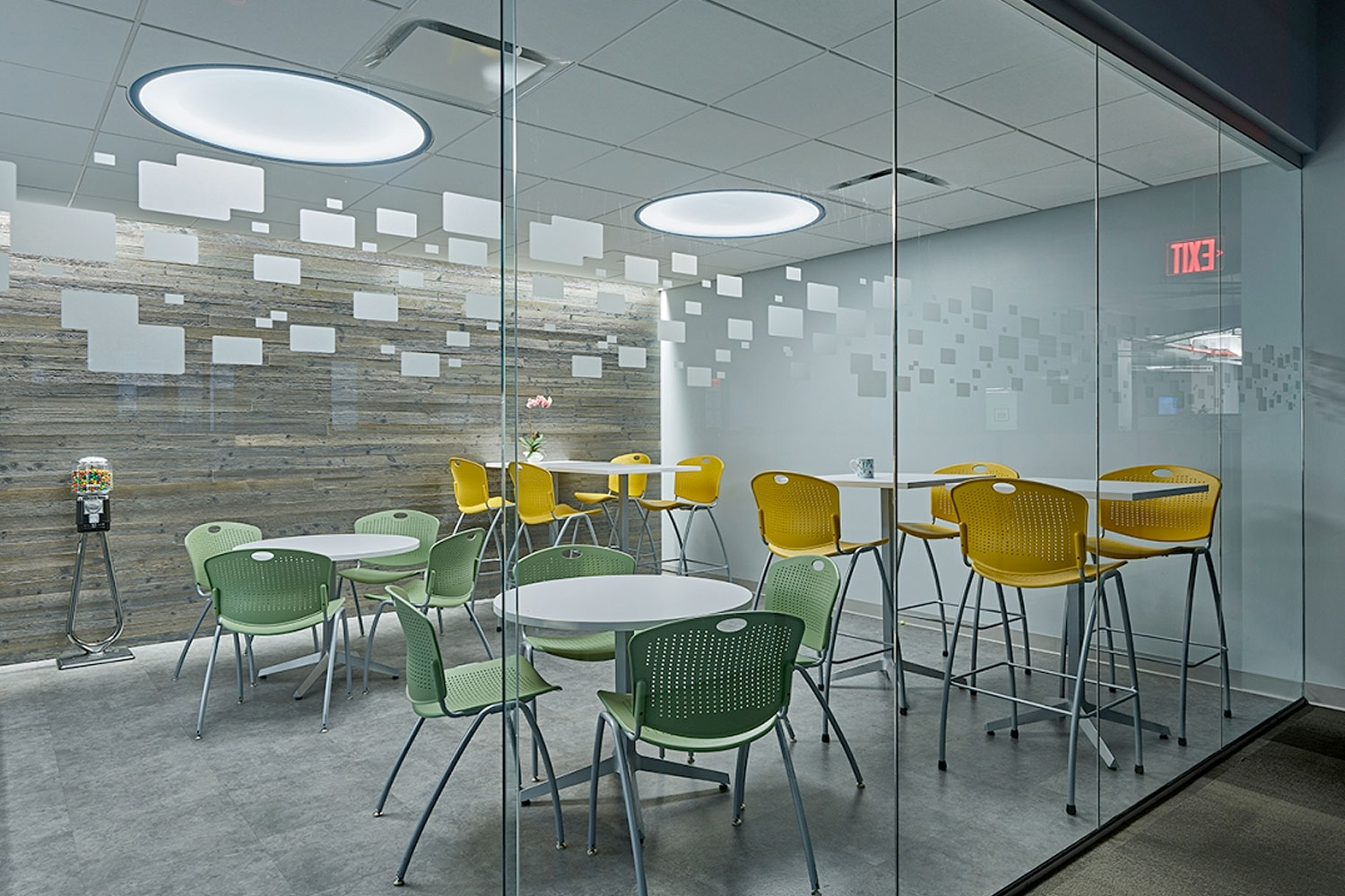 Two Large Symmetry Lights above a space for office meetings