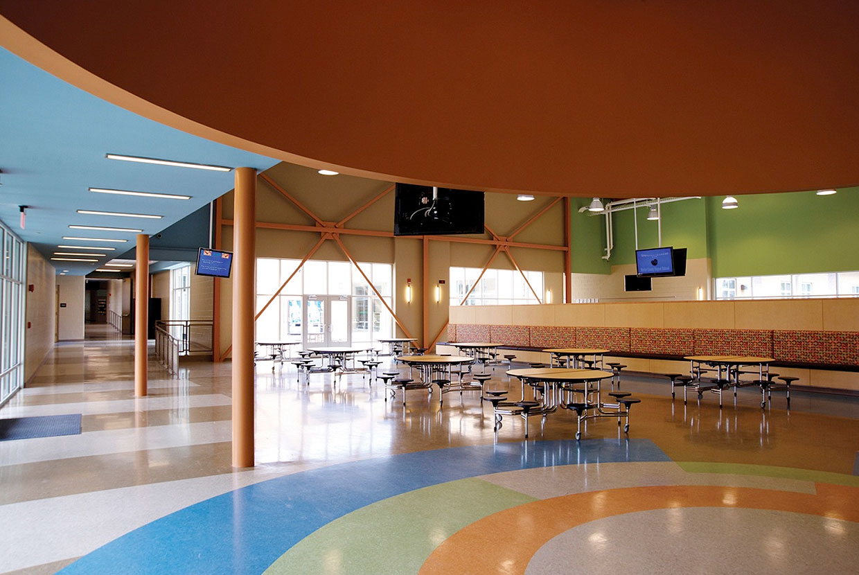 Visage is good supplementary classroom lighting, shown here in ceiling mount configuration above a school cafeteria.